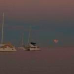 Musket Cove Morning..... s/v Simpatica and another boat with the moon set and the sunrise.....