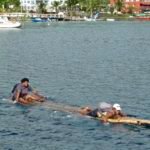 The daily commute.... Really it is. These two gals worked on the island only a few hundred yards from the town. This is how they got there....EVERY DAY!