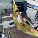 Anja gets into the swing of things...... Anja felt right at home as she slung her hammock under the Bimini. We'll go "hammer head diving" tomorrow with Peter of s/v "Quickstar"
