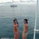 Navadra Island Snorkel.. The dynamic duo Kate & Sandrine go for a snorkel with s/v "Wetnose" in the background